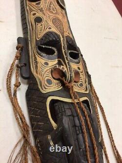 Wooden Sculpture of a face from tribes on the Sepik River in Papua New Guinea